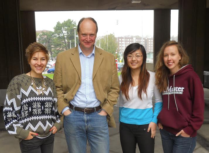 Dr. Matthew Woolhouse accompanied by three other members of the Digital Music Labs team, posing for the camera with their hands in their pockets.